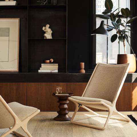 An eclectic sampling of Geiger furniture, including the pedestal from an I Beam Table, a Domino Storage sideboard, and a Saiba Lounge Chair.