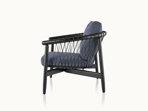 Side view of a Crosshatch lounge chair with dark blue fabric and a black wood frame.