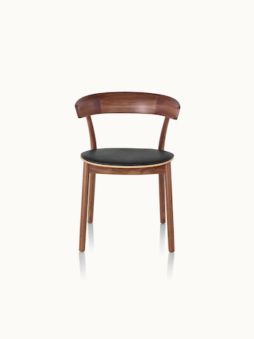 A Leeway side chair with a wood frame and backrest in a medium finish and a seat upholstered in black leather, viewed from the front.