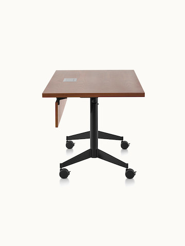 A rectangular MP Flex Table with a chocolate ash finish and black base, viewed from the side.