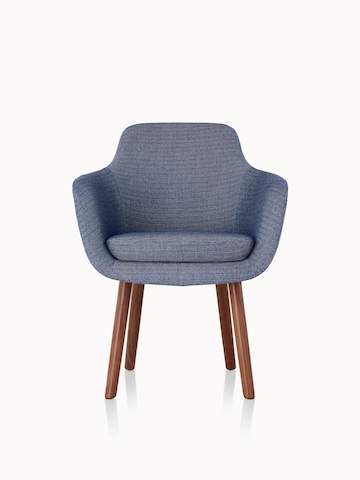 A Saiba Side Chair with blue upholstery and wood legs in a medium finish, viewed from the front.