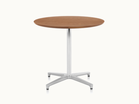 A round Saiba occasional table with a veneer top and aluminum pedestal base.