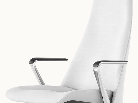 Angled view of the seat and back of a Taper office chair upholstered in off-white fabric.