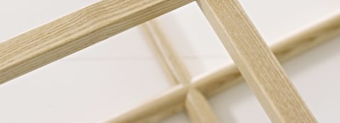 Partial overhead view of the wood frame of a Loophole Table. Partial overhead view of the wood frame of a Loophole Table.