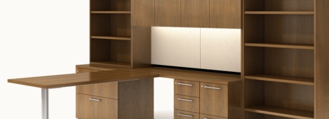 Partial view of Geiger Levels Casegoods private office furniture, focusing on a peninsula work surface and storage. Partial view of Geiger Levels Casegoods private office furniture, focusing on a peninsula work surface and storage.