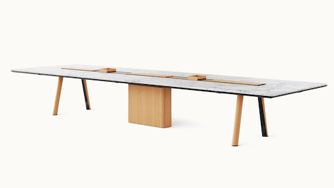 Ascent Conference Table designed by EOOS for DatesWeiser in White Carrara polished marble with natural rift cut oak base shown at an angle on a white sweep.