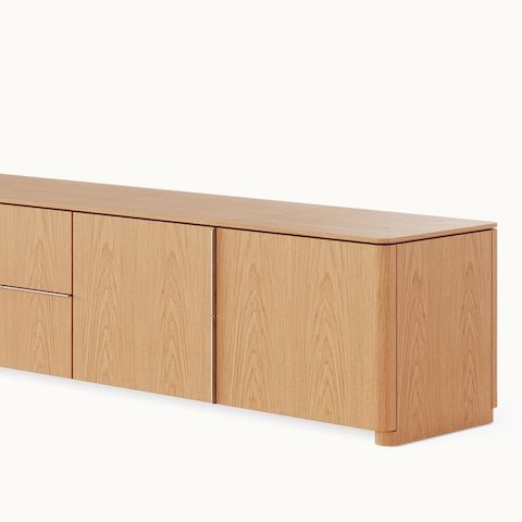 Ascent Credenza designed by EOOS for DatesWeiser in natural flat cut oak shown at an angle on a white sweep.