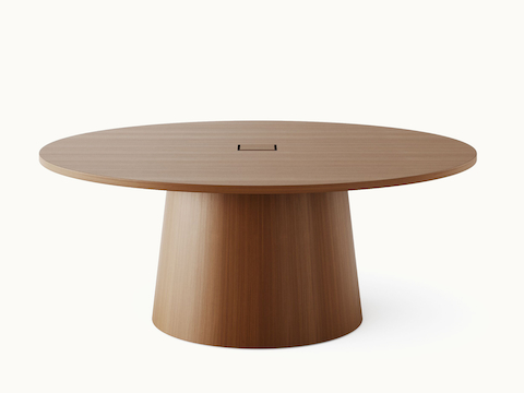 JD Meeting Table by DatesWeiser with round top and round tapered base in natural quarter cut walnut shown front-facing on a white sweep.