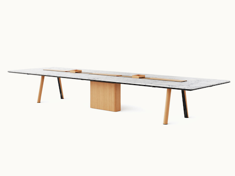 Ascent Conference Table designed by EOOS for DatesWeiser in White Carrara polished marble with natural rift cut oak base shown at an angle on a white sweep.