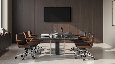 Highline Conference Table and Highline 25 Credenza by DatesWeiser in Black Granite with Clamshell Chairs in conference room.