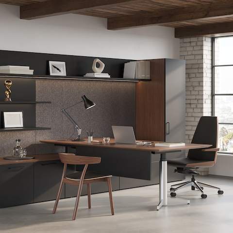 Geiger One Private Office in a loft setting in Walnut Recograin with Clamshell Office Chair and Leeway Guest Chair.