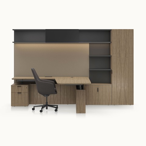 A Geiger One Private Office in Natural Flat Cut Walnut with a Saiba Office Chair viewed from the front.
