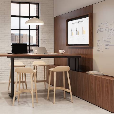 Geiger One Meeting and Huddle Room in Natural Walnut with Crosshatch Stools.