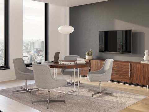 Bumper Side Chair with Low Arms in a meeting room environment with a Domino Meeting Table.