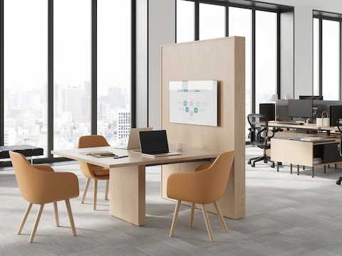 JD Media Table by DatesWeiser in Natural Oak with Saiba Side Chairs and Geiger One Open Plan Workstation in Background.