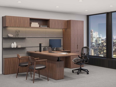 Geiger One Private Office in Natural Walnut with Aeron Task and Crosshatch Guest Seating.