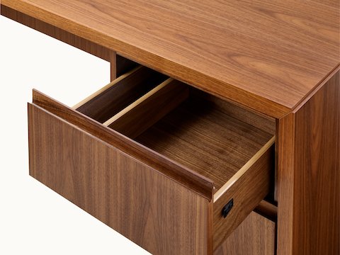 Geiger One Casegoods Mitered Desk with open drawer detail view.