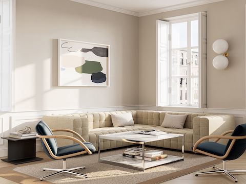 Full Loop Lounge Chairs with Rapport Sofa and H Frame Coffee Table in a residential or collaborative office setting.