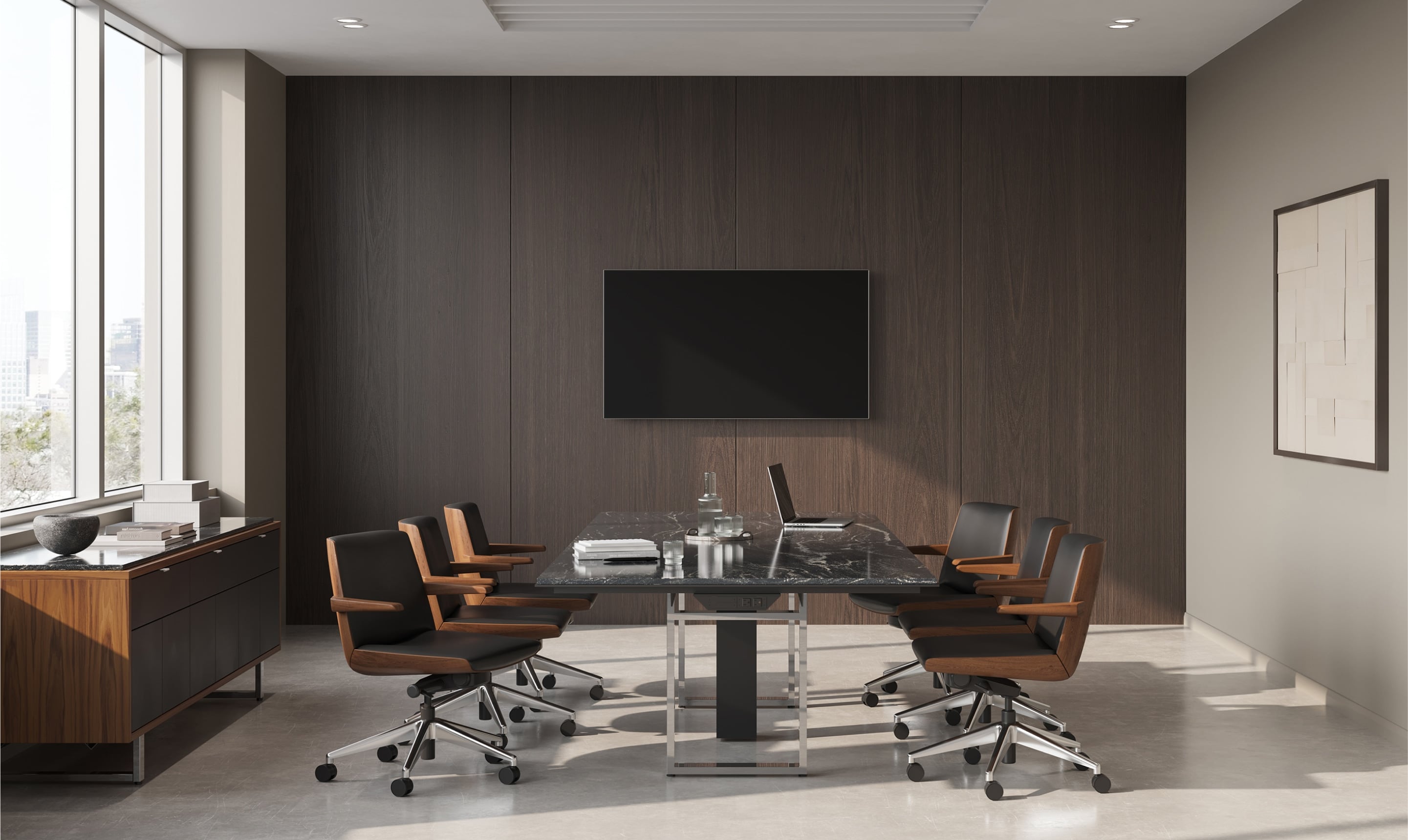 A meeting room featuring a rectangular Axon conference table with a wood top surrounded by six Taper office chairs in camel-colored leather upholstery.