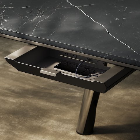 Detail shot of the Ascent Conference Table designed by EOOS for DatesWeiser showing open power drawer.