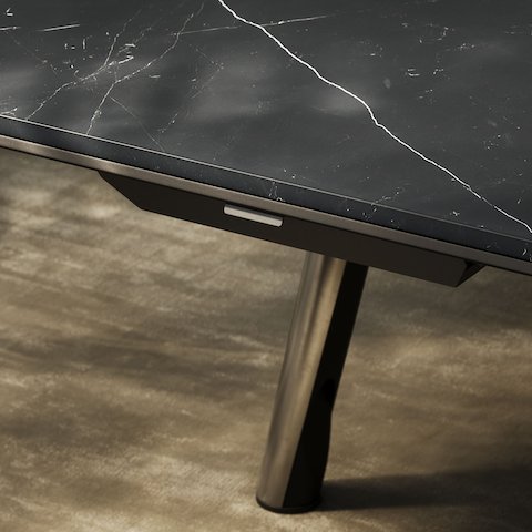 Detail shot of the Ascent Conference Table designed by EOOS for DatesWeiser showing closed power drawer.