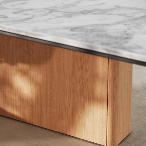 Detail shot of the Ascent Conference Table designed by EOOS for DatesWeiser showing closed wire management base.