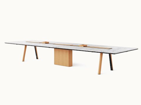 Ascent Conference Table designed by EOOS for DatesWeiser in White Carrara polished marble with natural rift cut oak base shown at an angle on a white sweep.