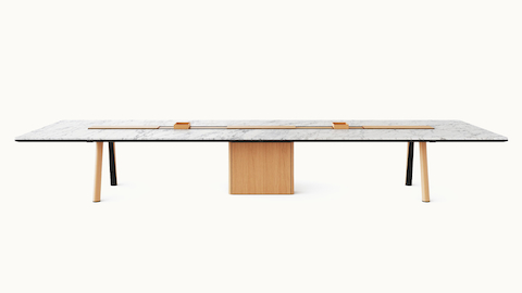Ascent Conference Table designed by EOOS for DatesWeiser in White Carrara polished marble with natural rift cut oak base shown front-facing on a white sweep.