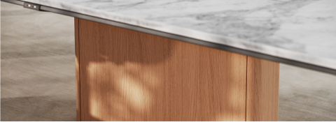 Detail shot of the Ascent Conference Table designed by EOOS for DatesWeiser showing closed wire management base.