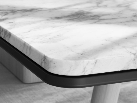 Detail of Ascent Conference Table by EOOS for DatesWeiser showing protective edge in White Carrara marble with natural rift cut oak base viewed at an angle. Detail of Ascent Conference Table by EOOS for DatesWeiser showing protective edge in White Carrara marble with natural rift cut oak base viewed at an angle.