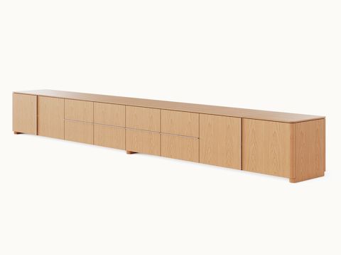 Ascent Credenza designed by EOOS for DatesWeiser in natural flat cut oak shown at an angle on a white sweep.