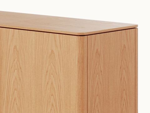 Ascent Credenza designed by EOOS for DatesWeiser in natural flat cut oak shown at an angle on a white sweep.