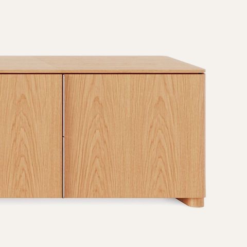 Ascent Credenza designed by EOOS for DatesWeiser in natural flat cut oak shown front-facing on a white sweep.