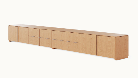 Ascent Credenza designed by EOOS for DatesWeiser in natural flat cut oak shown at an angle on a white sweep. Ascent Credenza designed by EOOS for DatesWeiser in natural flat cut oak shown at an angle on a white sweep.