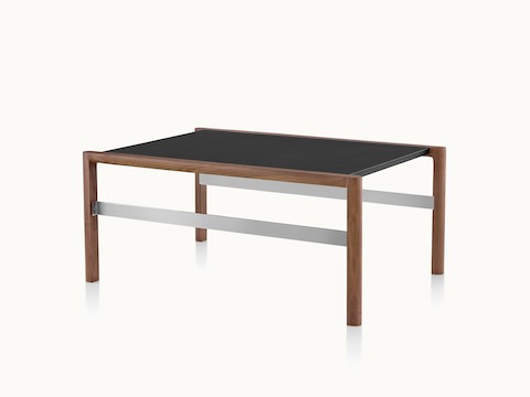 A rectangular Brabo Table with a leather-wrapped top and metal frame supports, viewed at an angle.