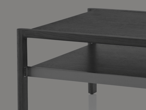 A Brabo side table with a walnut top and lower shelf, viewed at an angle.
