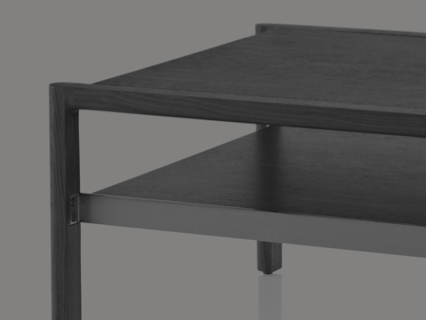 A Brabo side table with a walnut top and lower shelf, viewed at an angle. A Brabo side table with a walnut top and lower shelf, viewed at an angle.