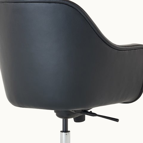 Bumper Chair with standard arms and five star base with casters, rear view.