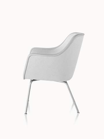 Side view of a Bumper side chair with light gray fabric upholstery.
