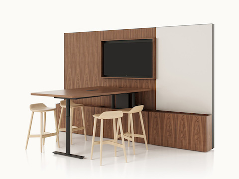 Geiger One Meeting and Huddle Room in Natural Walnut with Crosshatch Stools. Select to go to the Meeting and Huddle Rooms landing page.