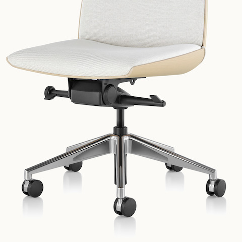 The lower portion of a Clamshell office chair, showing the five-star swivel base with casters.
