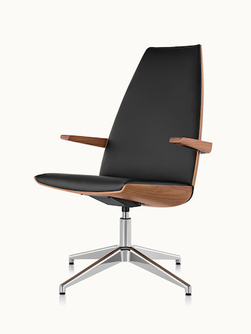 Angled view of a high-back Clamshell Lounge Chair with black leather upholstery and a four-star base.