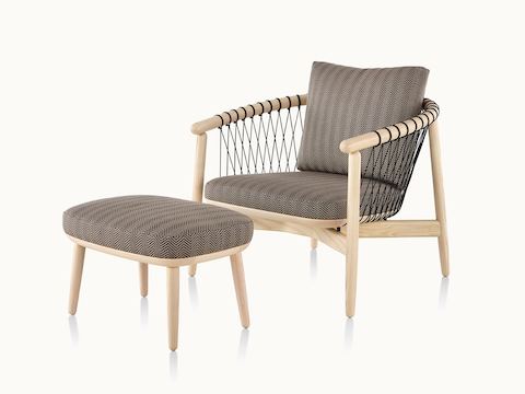 Angled view of a Crosshatch lounge chair and ottoman with taupe fabric and a light wood frame.