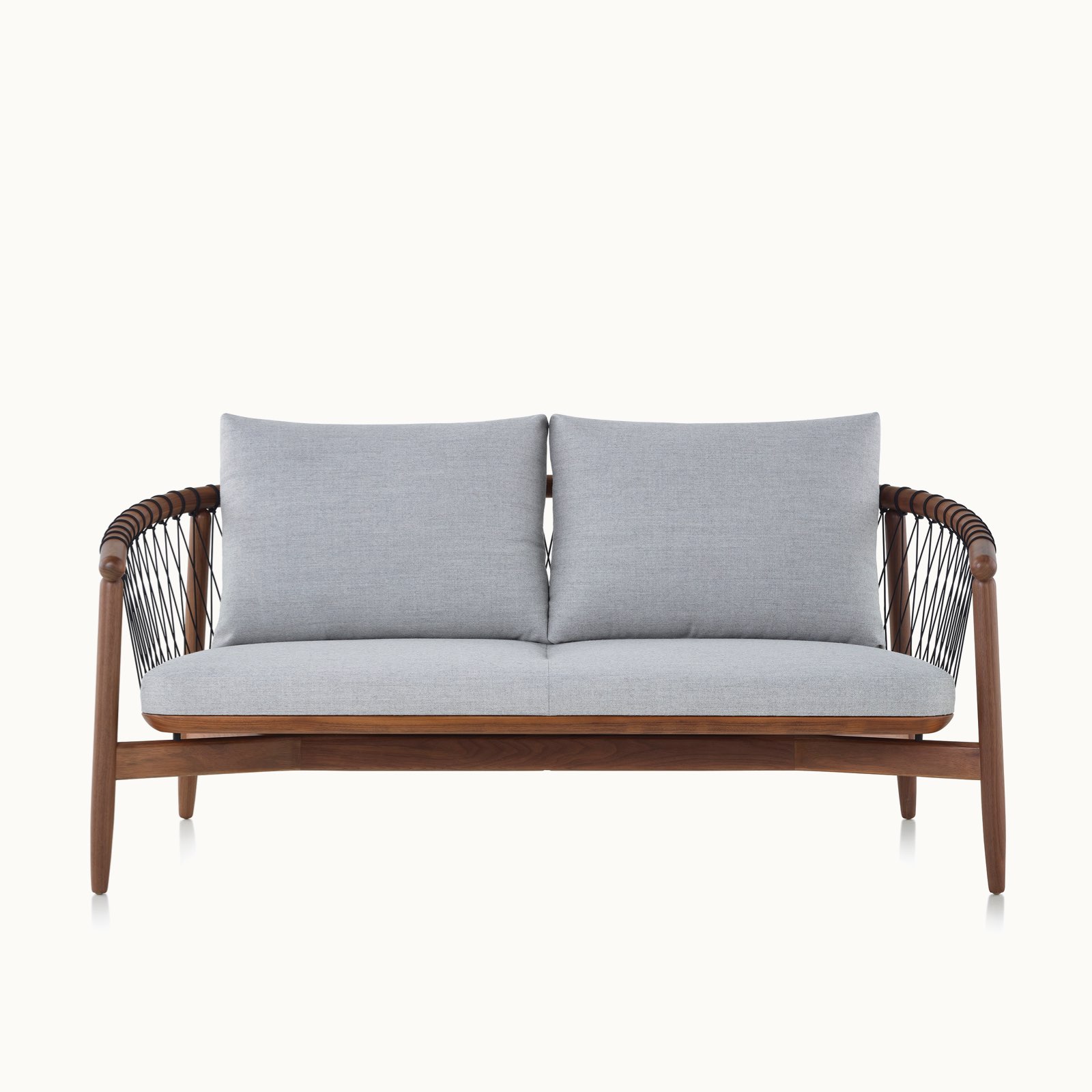A Crosshatch Settee with a walnut frame, black cords, and light neutral fabric, viewed from the front.