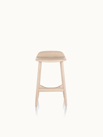 A counter-height wood Crosshatch Stool with a light finish, viewed from the front.
