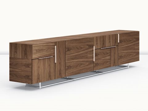 A Domino Storage credenza with a medium wood finish, viewed at an angle.