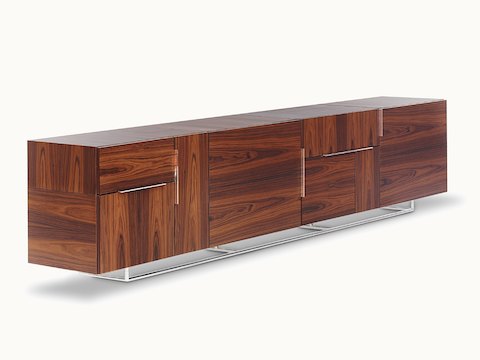 A Domino Storage credenza with a dark wood finish, viewed at an angle.