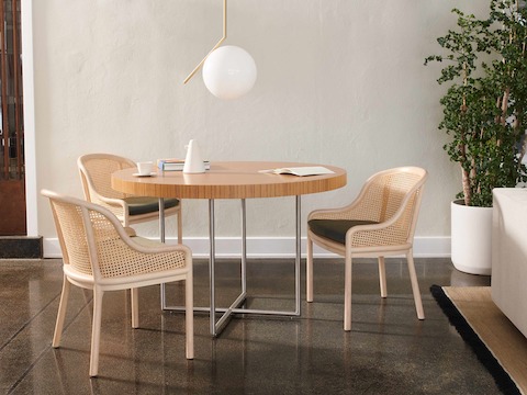 A common area featuring a Domino Table and Landmark Chairs.