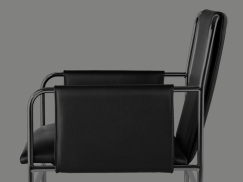 Black-and-white image of an Envelope side chair, viewed from the side to show how the leather upholstery wraps around the tubular steel frame.