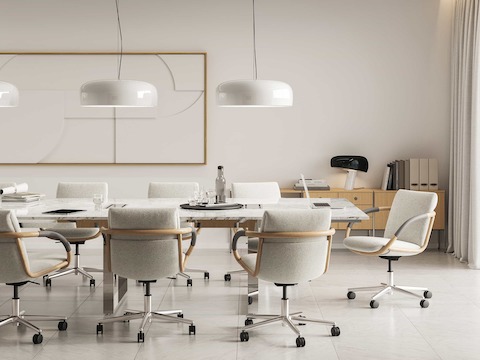 Full Loop office chairs around a DatesWeiser Conference Table in a conference room setting.